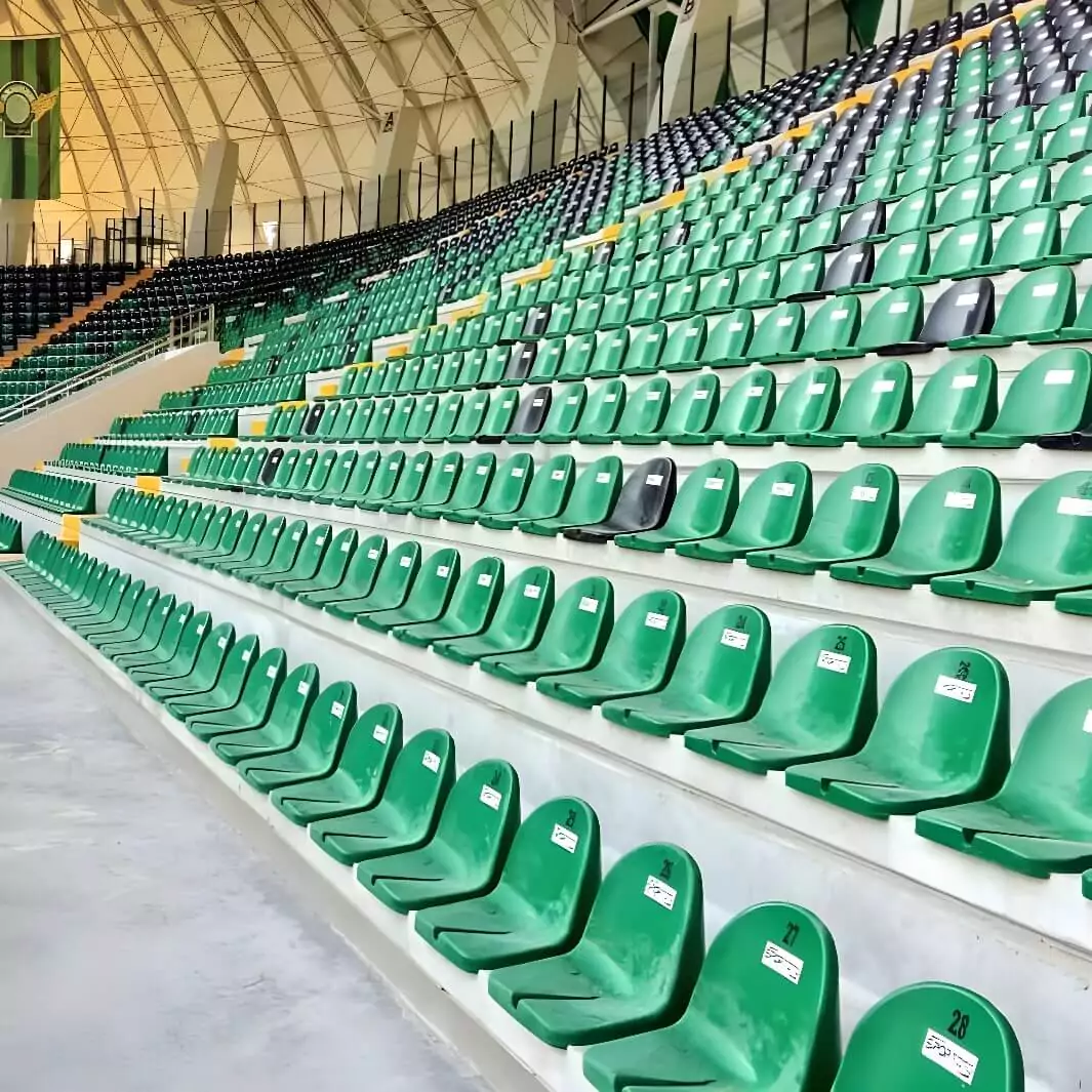 Telescopic seating solutions were implemented for this multipurpose sports venue, allowing for flexible configurations and efficient space management. Image